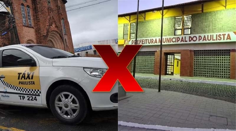 lateral de um táxi e faixada da prefeitura de paulista