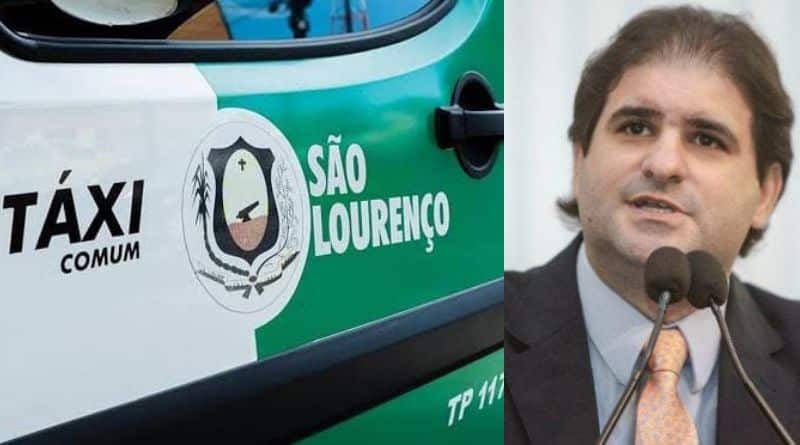 porta de um táxi e prefeito de São Lourenço da Mata, Vinícius Labanca